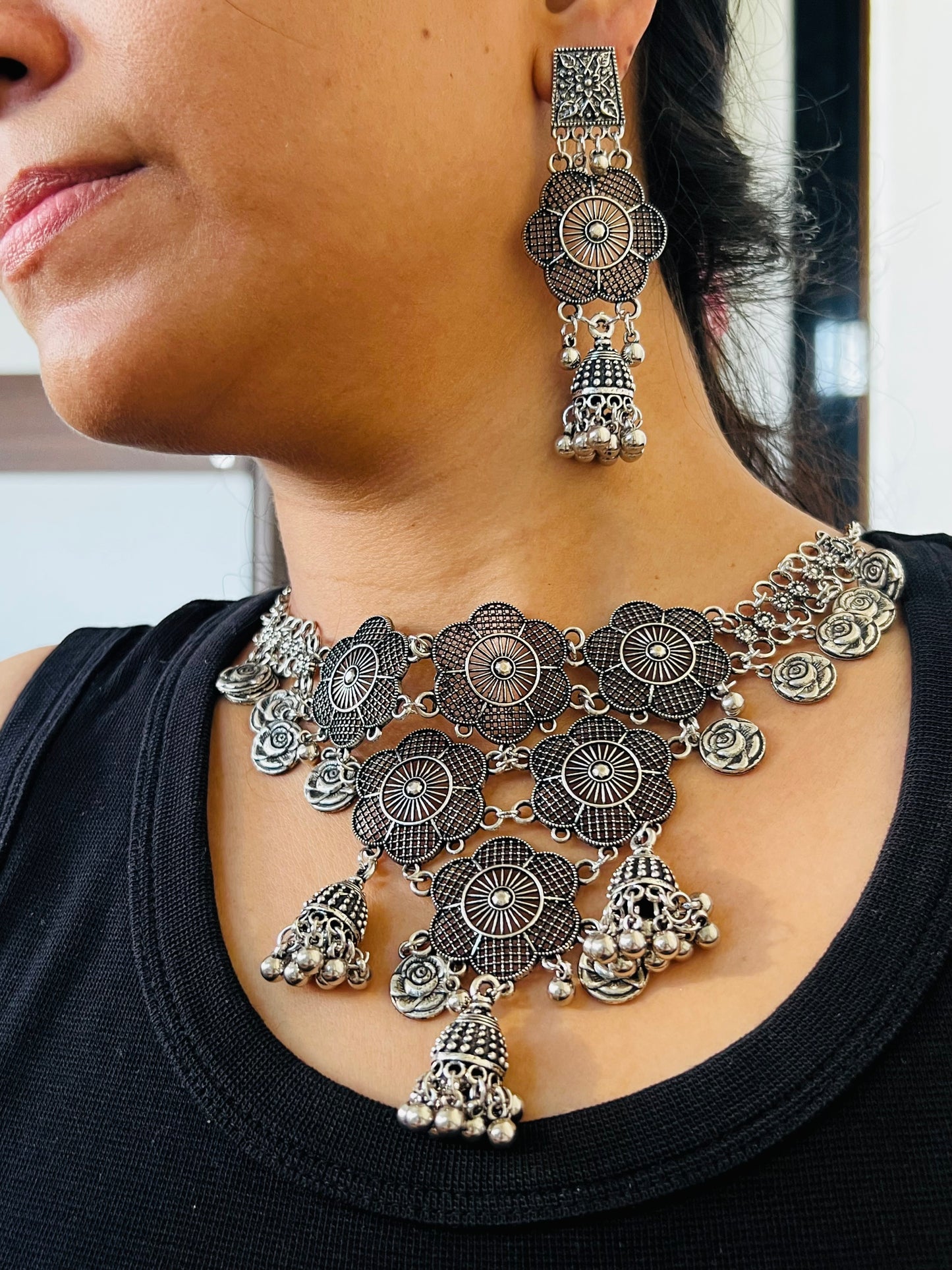 Oxidized Silver Necklace Set with Floral Motifs and Bell Charms