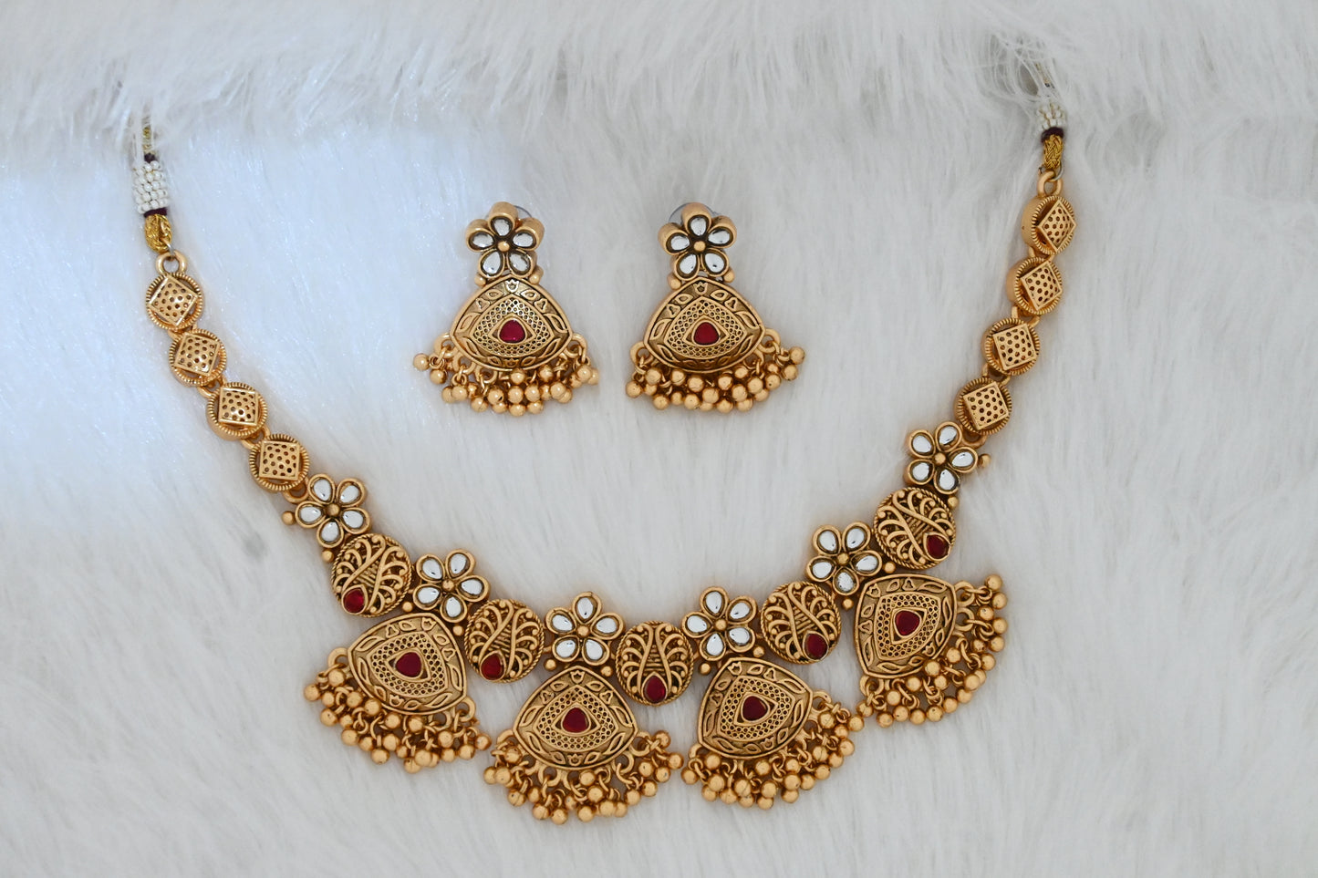 Antique gold necklace set, temple jewelry set, traditional necklace with earrings, bridal jewelry, ethnic necklace set, festive jewelry, South Indian style jewelry, gold-plated necklace, jhumka earrings, wedding jewelry set.