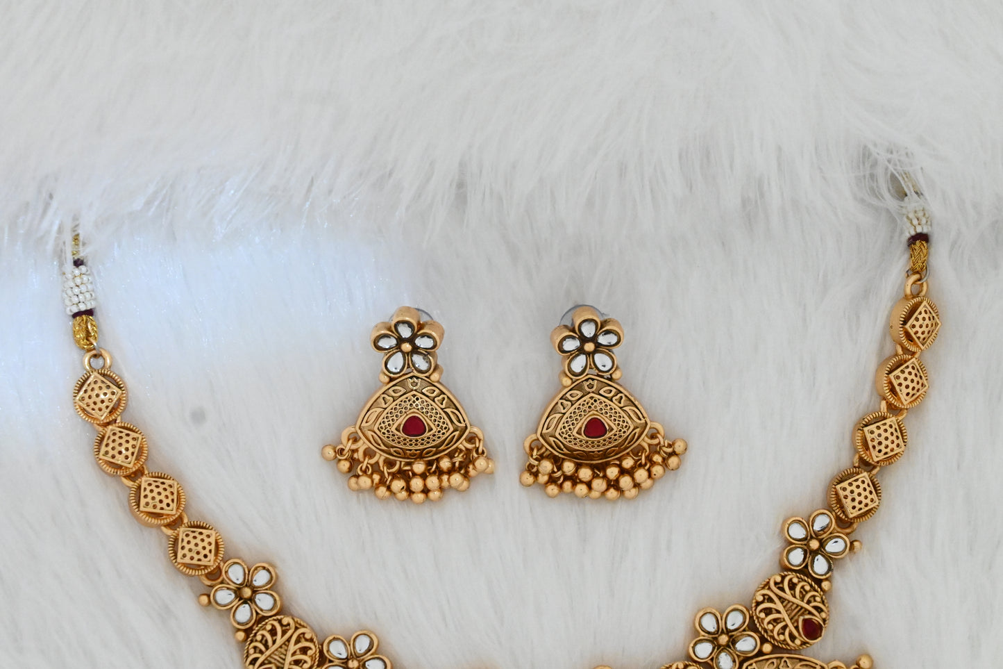 Antique gold necklace set, temple jewelry set, traditional necklace with earrings, bridal jewelry, ethnic necklace set, festive jewelry, South Indian style jewelry, gold-plated necklace, jhumka earrings, wedding jewelry set.