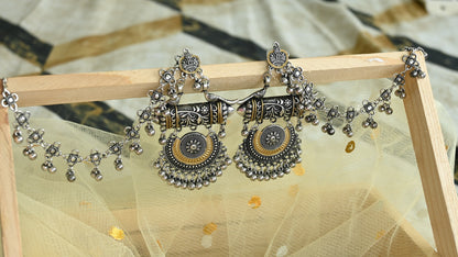 Oxidised dual tone chandelier earrings with ear chain