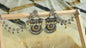 Oxidised dual tone chandelier earrings with ear chain