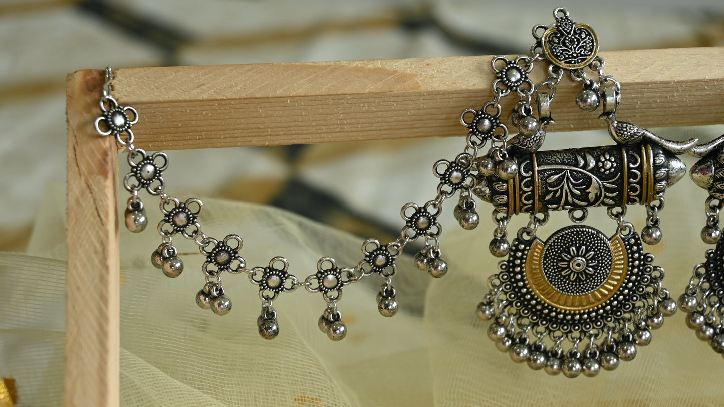 Oxidised dual tone chandelier earrings with ear chain