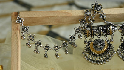 Oxidised dual tone chandelier earrings with ear chain