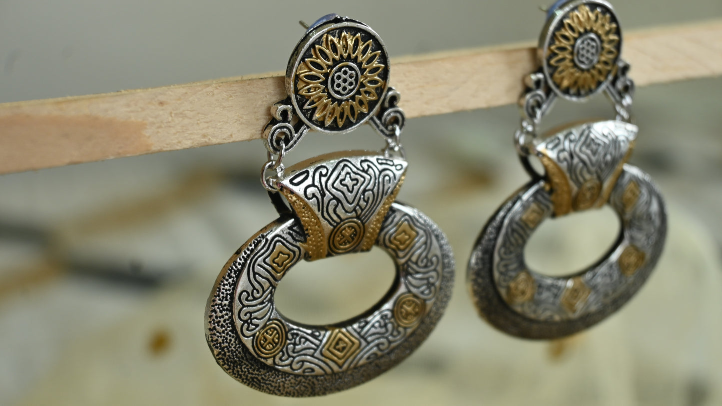 Oxidised dual tone dangler earrings